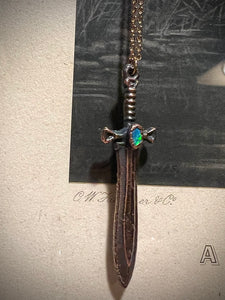 Flashy blue opal sword necklace