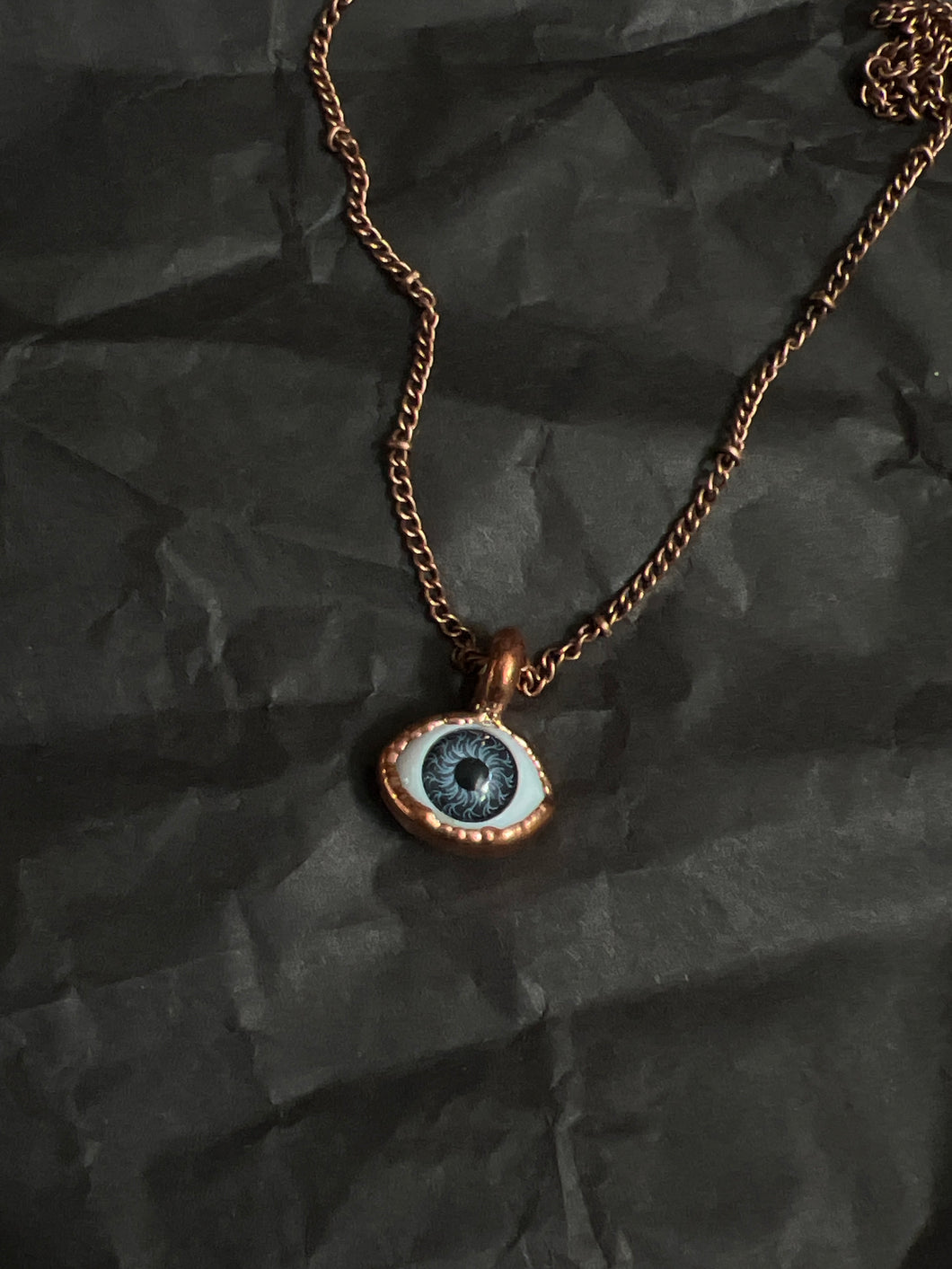 Copper electroformed eye necklace
