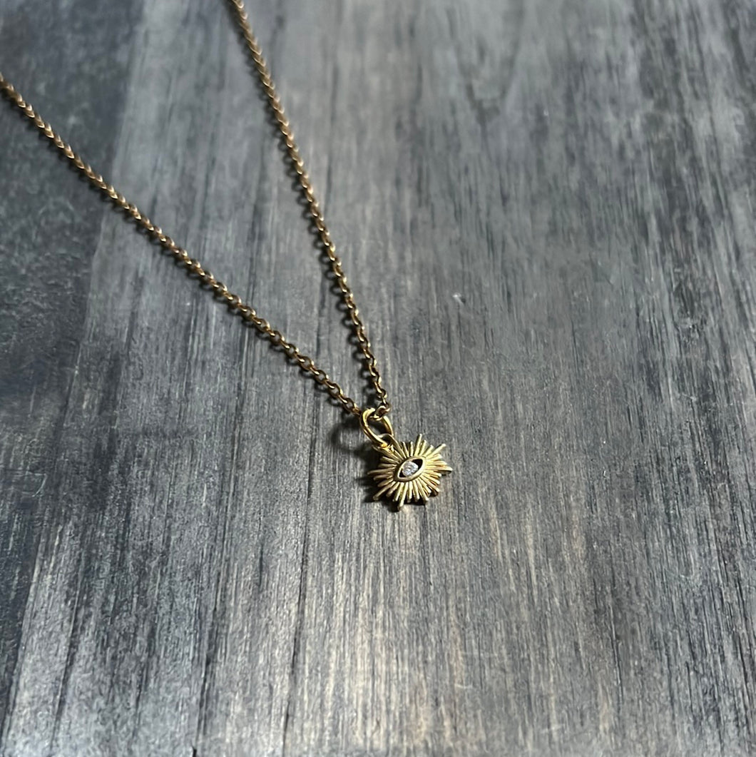 Gold plated sun and  eye necklace