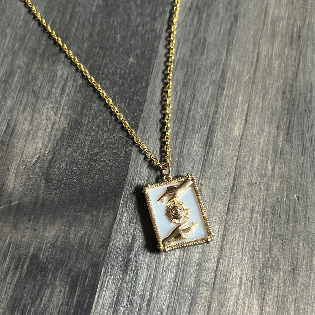 Hand and eye sun necklace ￼