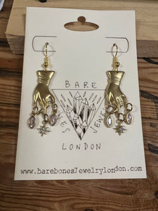 Hand and star earrings