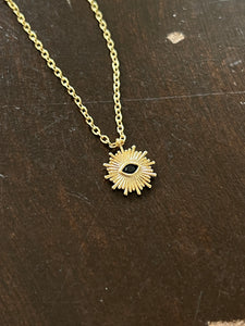 Gold plated Brass sun and black eye necklace