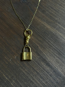 Large padlock and hand necklace
