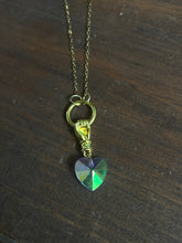 Load image into Gallery viewer, Iridescent heart and hand necklace ￼
