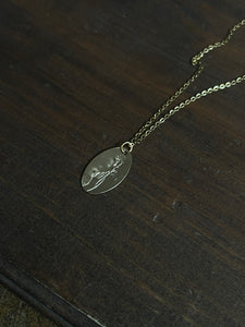 Hand and rose necklace