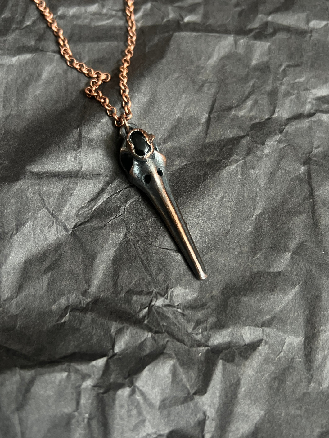 Copper bird skull necklace