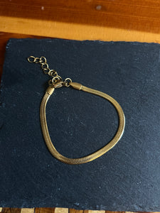Thin herringbone bracelet gold coated stainless steel