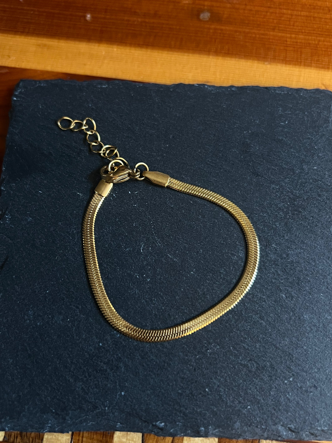 Thin herringbone bracelet gold coated stainless steel
