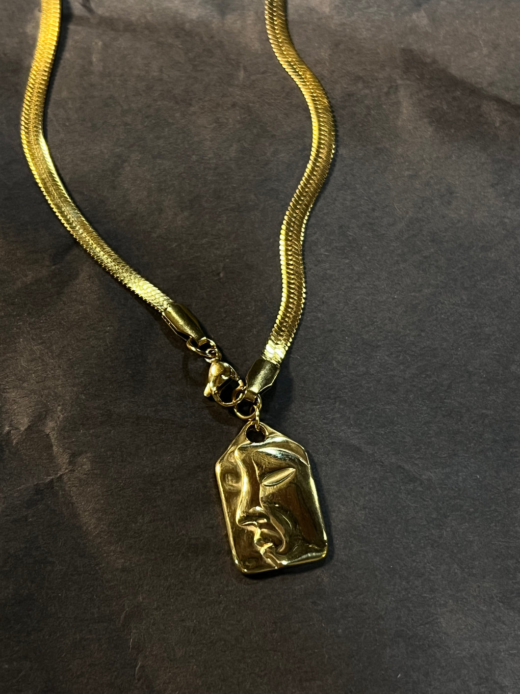 Face necklace